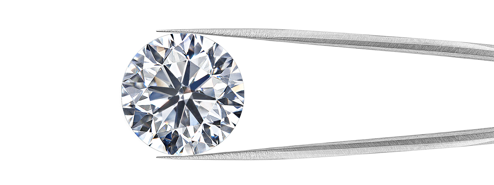 diamond in tweezers